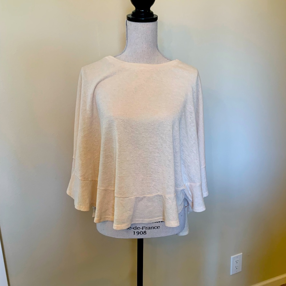 Cream colored, light weight women’s sweater
